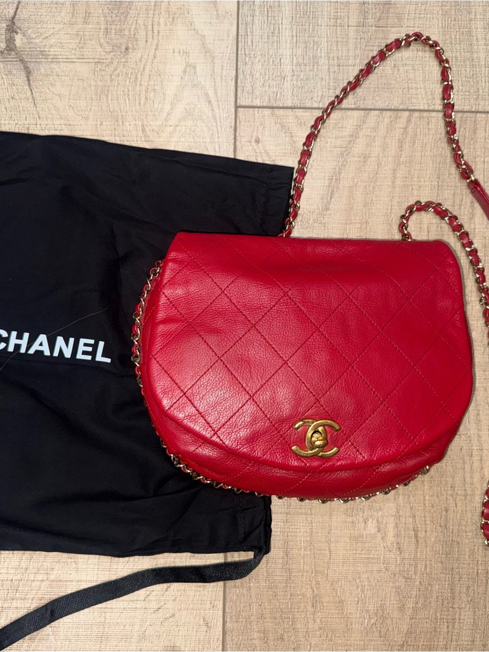CHANEL Red Quilted Leather Half-Moon Crossbody with Gold Hardware